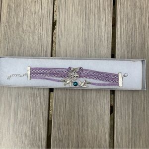 braided bracelet with variety of charms